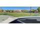 Scenic view of the community park, featuring green spaces, walking paths, and inviting benches at 5524 Overlook Valley St, North Las Vegas, NV 89081