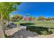 Vibrant playground in the community park, offering a fun and safe space for children to play at 5524 Overlook Valley St, North Las Vegas, NV 89081