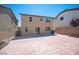 Spacious backyard featuring a large brick-paved area, perfect for outdoor activities and entertaining at 5638 Jelsma Ave, Las Vegas, NV 89141