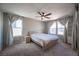 Bedroom featuring a ceiling fan, natural light, and neutral walls at 5638 Jelsma Ave, Las Vegas, NV 89141