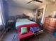 Bedroom featuring neutral-toned walls, carpet flooring and a ceiling fan and light fixture at 5832 Elphin Ct, North Las Vegas, NV 89031