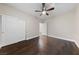 Spacious bedroom featuring hardwood floors and a double-door closet at 616 Canyon Brook Pl, Las Vegas, NV 89145