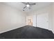 Bedroom featuring neutral carpet and a double-door closet at 616 Canyon Brook Pl, Las Vegas, NV 89145