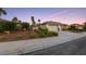Well-maintained home with mature trees and manicured landscaping at 616 Canyon Brook Pl, Las Vegas, NV 89145