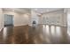 Spacious living room featuring wood floors and a cozy fireplace at 616 Canyon Brook Pl, Las Vegas, NV 89145