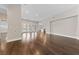 Open-concept living room with hardwood floors and plenty of natural light at 616 Canyon Brook Pl, Las Vegas, NV 89145
