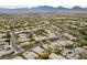 An aerial view of Summerlin neighborhood showcases well-maintained homes and landscaping at 616 Canyon Brook Pl, Las Vegas, NV 89145