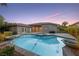 Backyard pool and spa featuring lush landscaping at 616 Canyon Brook Pl, Las Vegas, NV 89145