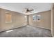 Neutral bedroom featuring a ceiling fan and multiple windows offering natural light at 637 Our Heritage St, Henderson, NV 89011