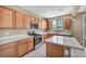Updated kitchen featuring stainless steel appliances and generous counter space at 637 Our Heritage St, Henderson, NV 89011