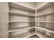 Walk-in pantry offering ample storage space with built-in shelving at 637 Our Heritage St, Henderson, NV 89011