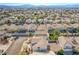 High-angle view of a residential area, featuring neatly arranged homes and landscaped properties at 672 Peach Coral St, Las Vegas, NV 89183