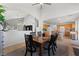 Inviting dining area featuring tile floors and an open layout adjacent to kitchen at 672 Peach Coral St, Las Vegas, NV 89183
