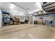 Spacious garage with ample storage and well-organized tools at 672 Peach Coral St, Las Vegas, NV 89183