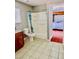 Bathroom featuring a granite-look vanity top, toilet and a shower/tub combination at 6786 Grandola Dr, Las Vegas, NV 89103