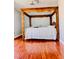 Spacious bedroom featuring a decorative wooden canopy bed with swan-shaped towels at 6786 Grandola Dr, Las Vegas, NV 89103