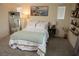 Cozy bedroom featuring a comfortable bed, stylish decor, and ample natural light at 6824 Satin Silver Ct, North Las Vegas, NV 89086
