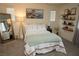 Cozy bedroom featuring a comfortable bed, stylish decor, and ample natural light at 6824 Satin Silver Ct, North Las Vegas, NV 89086