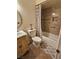 Cozy bathroom featuring a shower-tub combo and vintage-style vanity at 7104 Carrondale Way, Las Vegas, NV 89128