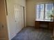 Bedroom with carpet, blinds on the window, and a closet, perfect for relaxing at 7147 S Durango Dr # 211, Las Vegas, NV 89113