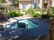 Inviting hot tub with lounge chairs, perfect for relaxation and enjoying the community amenities at 7147 S Durango Dr # 211, Las Vegas, NV 89113