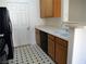 Efficient kitchen with laminate countertops, a double sink, and sleek black dishwasher at 7147 S Durango Dr # 211, Las Vegas, NV 89113