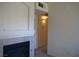 Comfortable living room with a cozy fireplace, providing a warm and inviting atmosphere at 7147 S Durango Dr # 211, Las Vegas, NV 89113