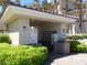 Enclosed mailbox area surrounded by green foliage and a trash receptacle at 7147 S Durango Dr # 211, Las Vegas, NV 89113