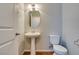Bathroom featuring a pedestal sink and modern fixtures at 9050 W Tropicana Ave # 1053, Las Vegas, NV 89147
