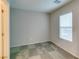 Bedroom featuring neutral paint, carpet, and a window with blinds at 9050 W Tropicana Ave # 1053, Las Vegas, NV 89147