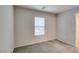 A bright bedroom with a window offers ample natural light at 9050 W Tropicana Ave # 1053, Las Vegas, NV 89147