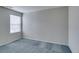 Bedroom featuring neutral carpet and a window for natural light at 9050 W Tropicana Ave # 1053, Las Vegas, NV 89147