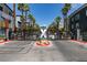 Community gate featuring modern design and manicured landscaping at 9050 W Tropicana Ave # 1053, Las Vegas, NV 89147