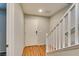 Entryway featuring wood floors, a neutral color scheme, and a staircase at 9050 W Tropicana Ave # 1053, Las Vegas, NV 89147