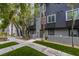 Attractive building offers a contemporary exterior, lush trees and manicured landscaping at 9050 W Tropicana Ave # 1053, Las Vegas, NV 89147