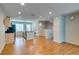 Open floor plan with recessed lighting, connecting living room to the kitchen with an island and stainless steel sink at 9050 W Tropicana Ave # 1053, Las Vegas, NV 89147