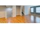 The modern living room has hardwood floors and staircase access at 9050 W Tropicana Ave # 1053, Las Vegas, NV 89147