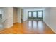 The spacious living room has vinyl wood flooring and lots of natural light at 9050 W Tropicana Ave # 1053, Las Vegas, NV 89147