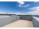 Take in city views from this rooftop deck with surrounding privacy walls and outdoor lighting at 9050 W Tropicana Ave # 1053, Las Vegas, NV 89147