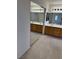 Bathroom mirror showing double sink vanity, shower with glass door, and tub at 9641 Windborne Ave, Las Vegas, NV 89147