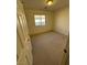 Bedroom with neutral carpet, window and standard lighting at 9641 Windborne Ave, Las Vegas, NV 89147