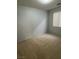 Bedroom with a carpeted floor, window and neutral paint at 9641 Windborne Ave, Las Vegas, NV 89147