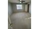 Spacious bedroom with carpeted floor, ceiling fan and natural light at 9641 Windborne Ave, Las Vegas, NV 89147
