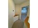 Hallway nook with triangle shelf looking into another room at 9641 Windborne Ave, Las Vegas, NV 89147