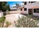 Backyard with desert landscaping, including a patio and gravel at 9704 Falling Star Ave, Las Vegas, NV 89117