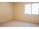 Bedroom featuring carpet flooring and a window at 9704 Falling Star Ave, Las Vegas, NV 89117