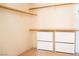 Walk-in closet with built-in shelving and drawers for ample storage at 9704 Falling Star Ave, Las Vegas, NV 89117
