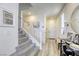 Entryway with a staircase, decorative accents, and bright natural light at 9772 Alpine Style Dr, Las Vegas, NV 89166