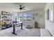 Bright office space with a modern desk, shelving, and plenty of natural light at 9772 Alpine Style Dr, Las Vegas, NV 89166