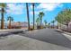Entrance to Antelope Canyon community shows palm trees and clean streets at 9962 Catalina Canyon Ave, Las Vegas, NV 89147